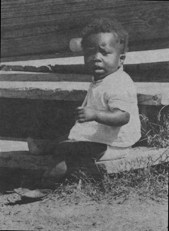 toddler sitting on steps